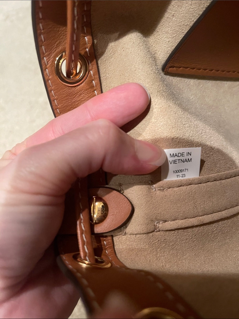 Tory Burch Monogram Bucket Bag - Picture 14 of 14